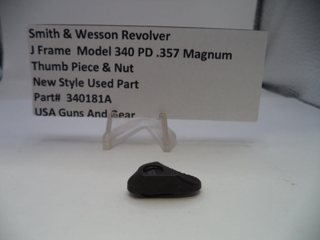Black thumb piece & nut for Smith & Wesson Revolver on a white card with product details.