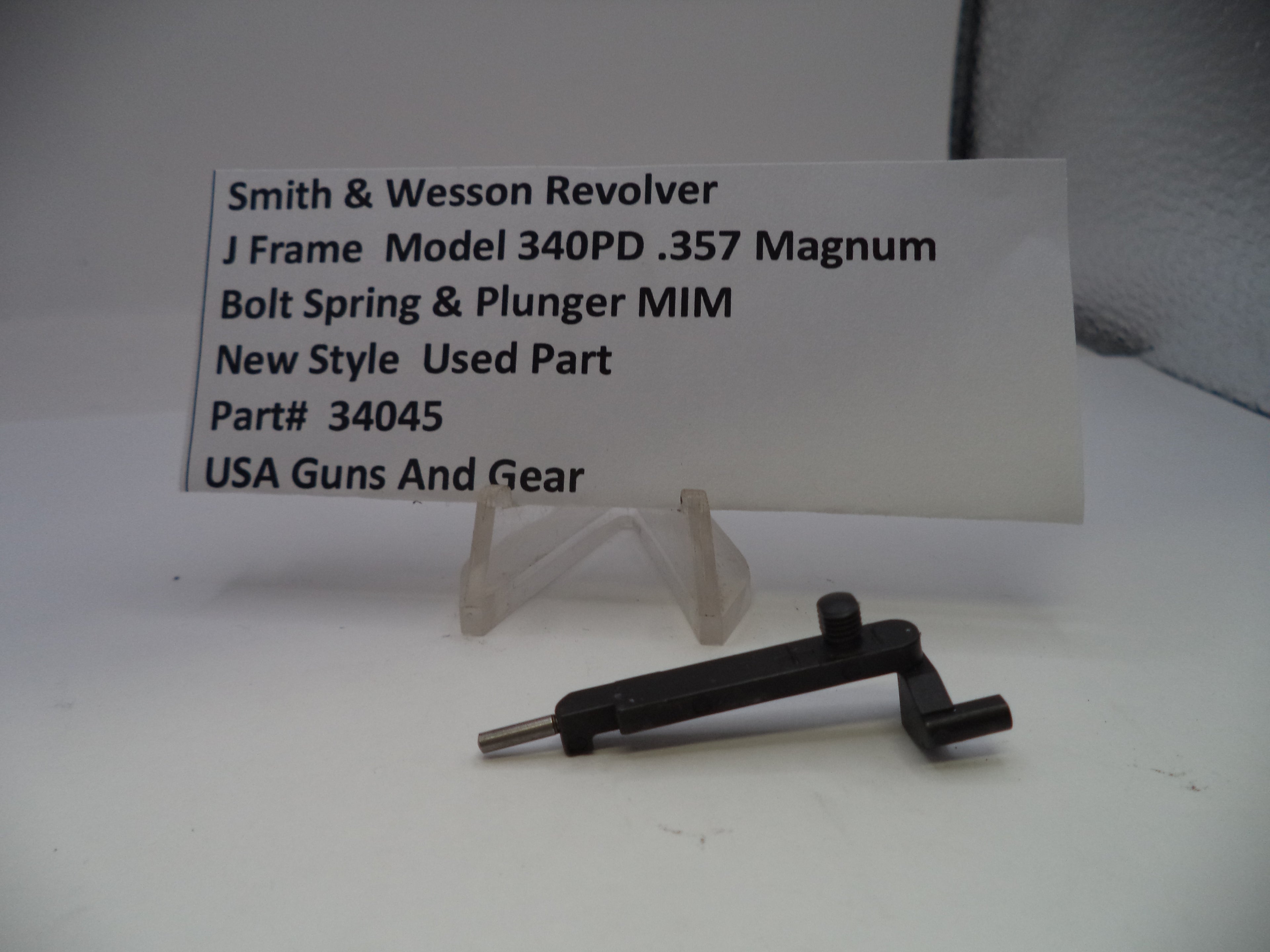 Bolt spring and plunger for Smith & Wesson Revolver on a white background with a label.