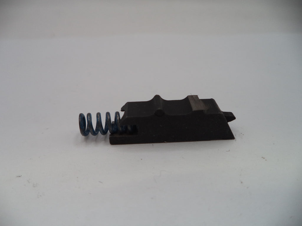 Mechanical component with a spring on a white background