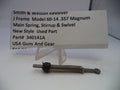 Smith & Wesson revolver main spring, stirrup, and swivel on a white background with a label.