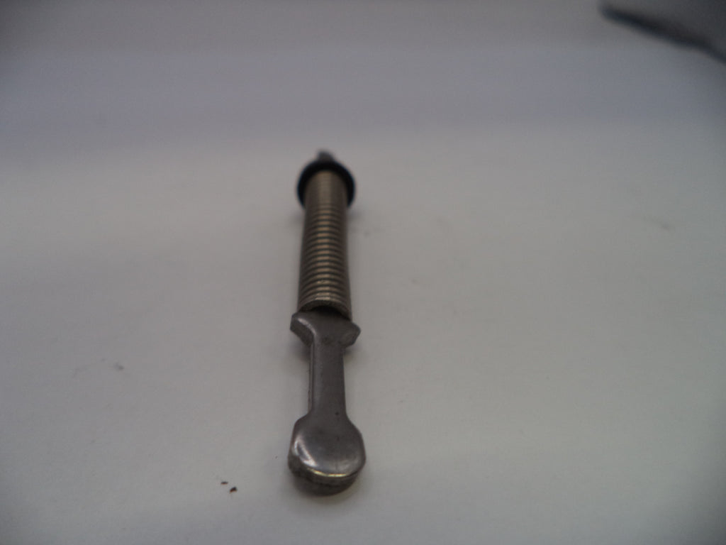 Metal bolt with a spring on a white surface