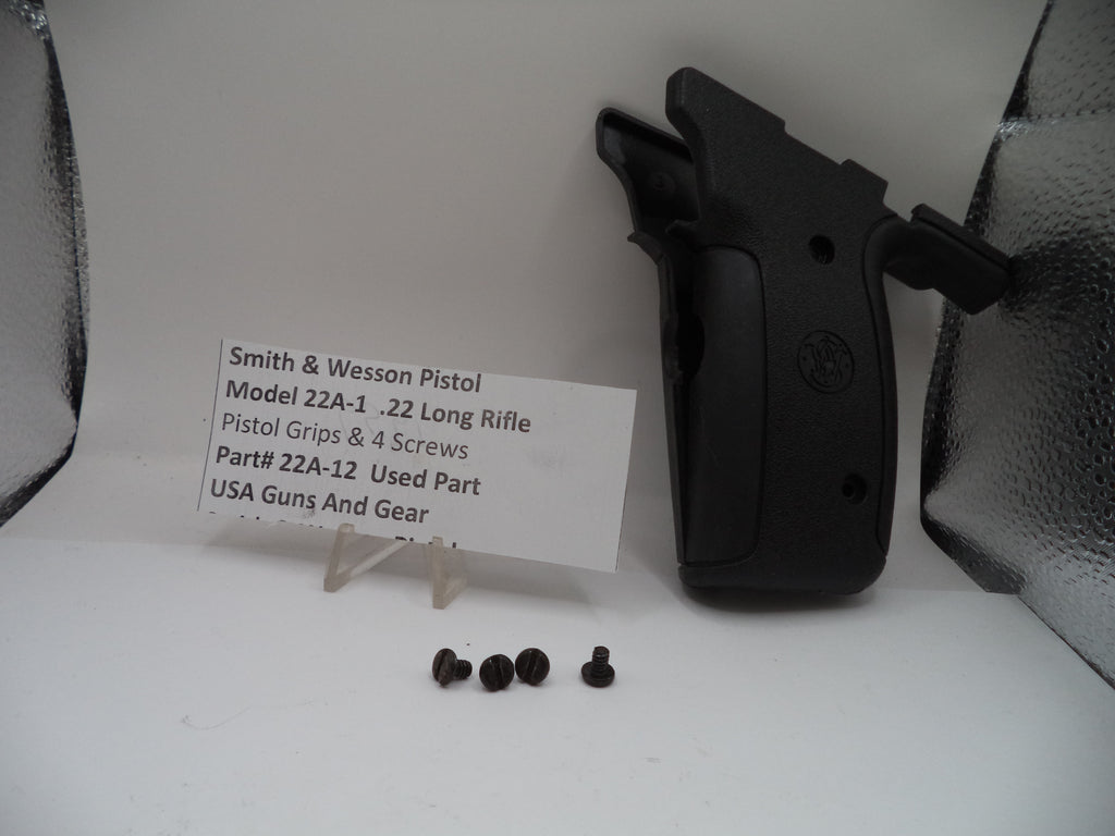 Smith & Wesson pistol grip and screws on a white background with a label.