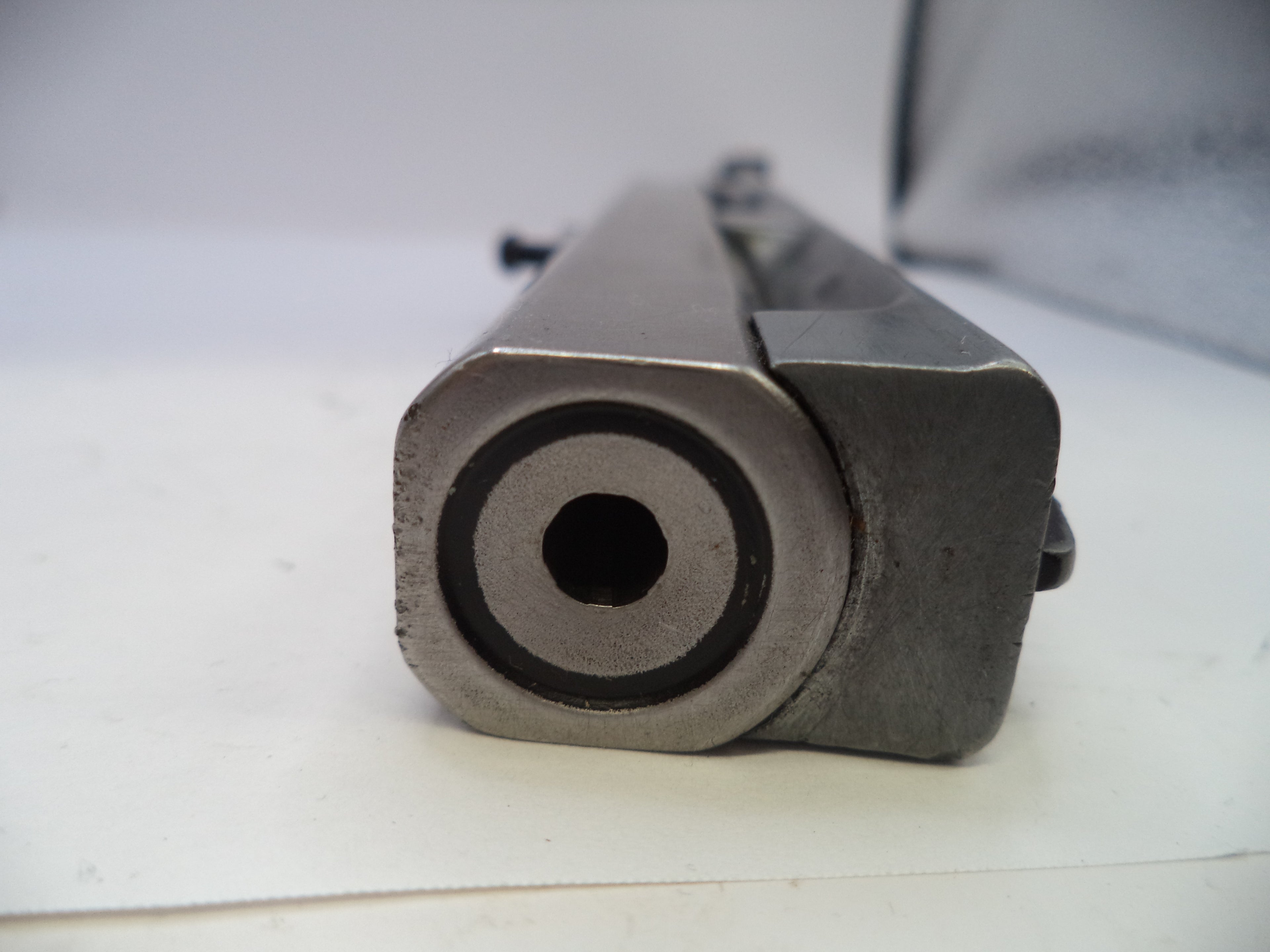 Close-up of a metallic object on a white background