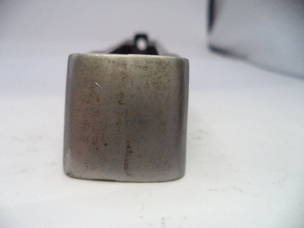 Metallic square object on a white background