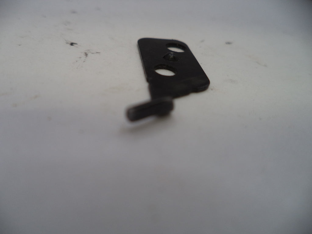 Small black metal lever on a white background