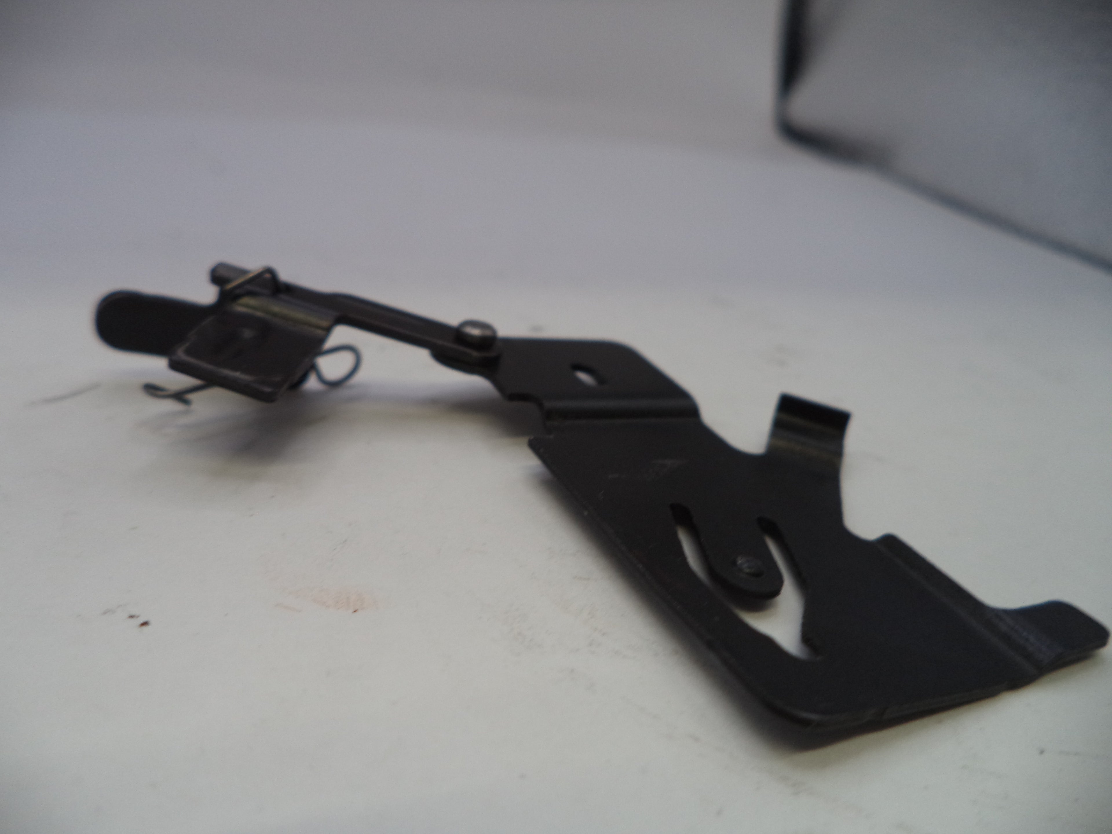 Black metal bracket on a white background