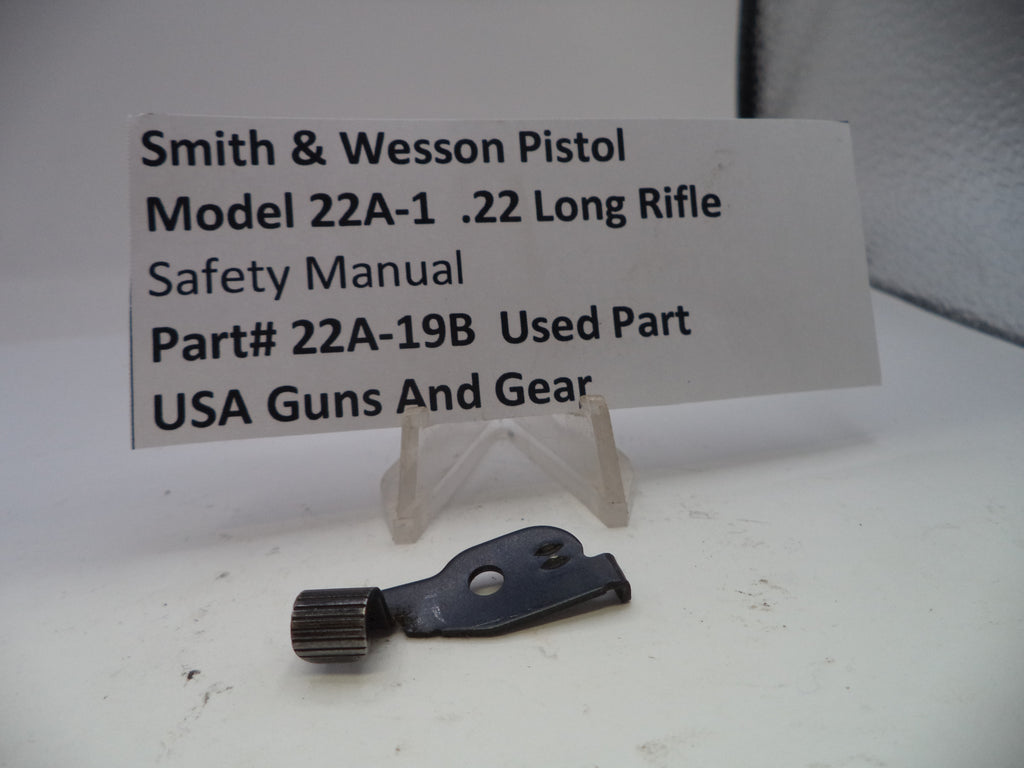 Smith & Wesson pistol safety manual part on a white surface with a label