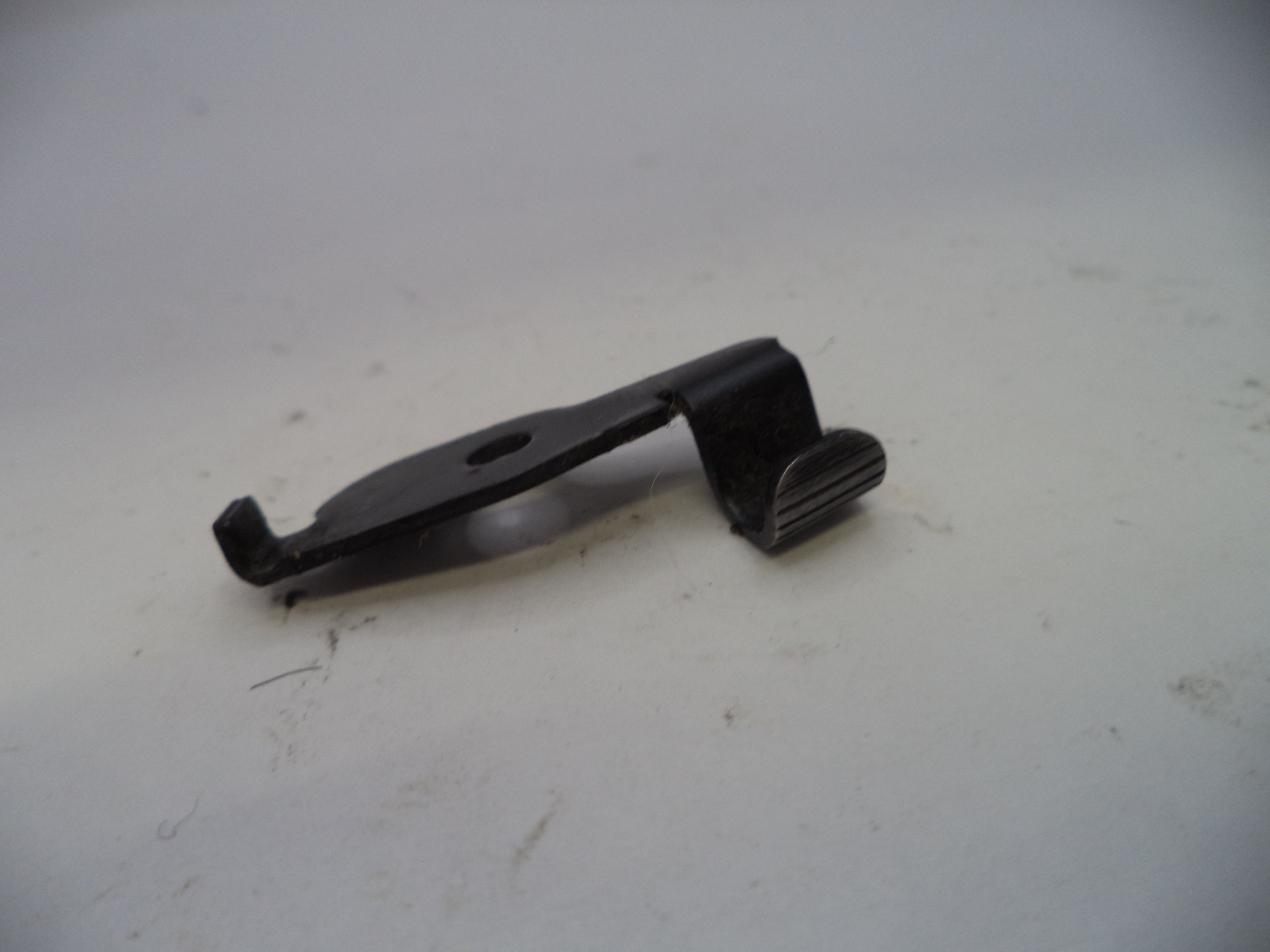 Black metal clip on a white background