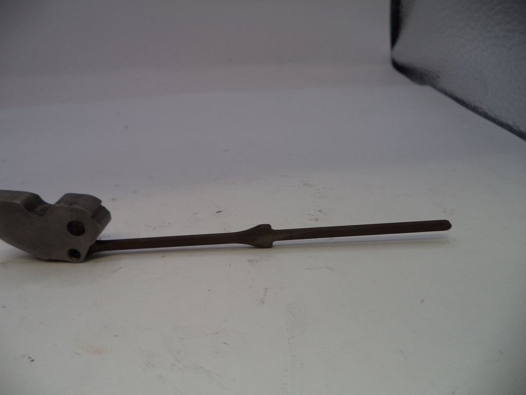 Metallic tool or component on a white background