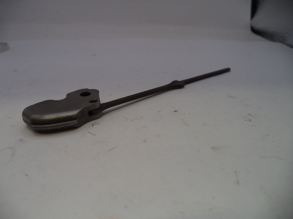 Metal tool on a white surface
