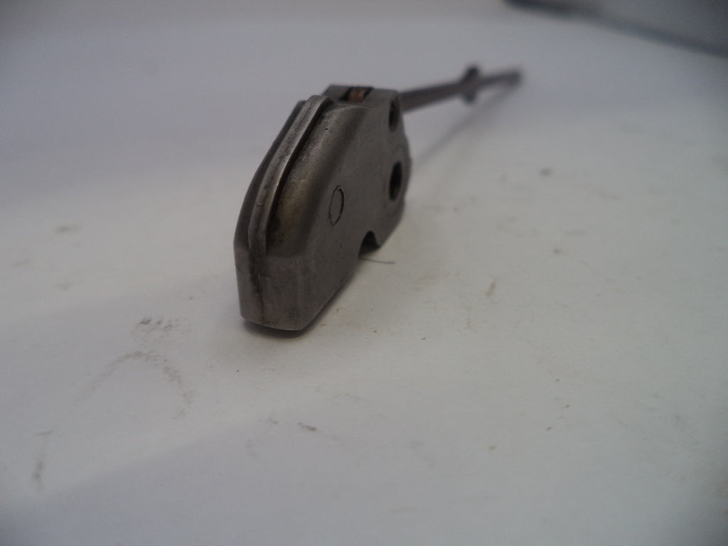 Metallic object on a white surface