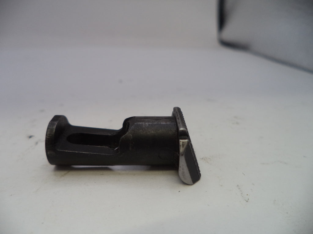 Metal and rubber component on a white surface