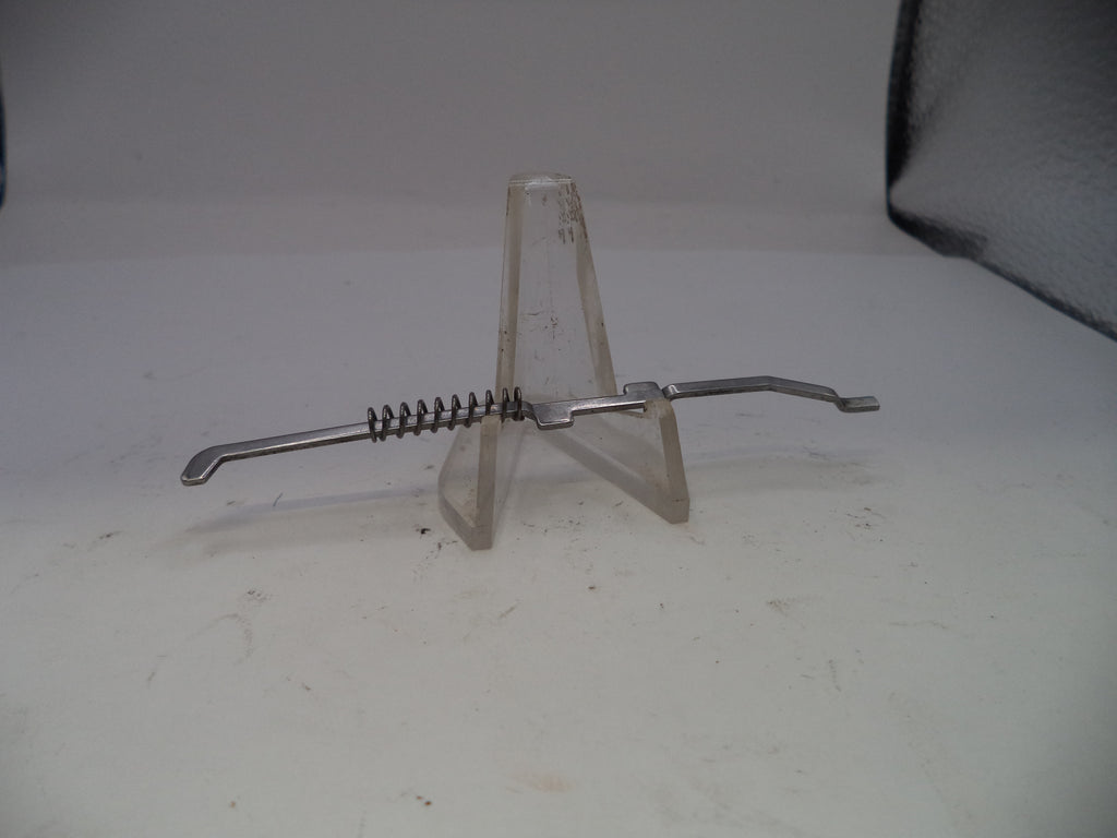 Metallic kitchen tool on a stand with a white background