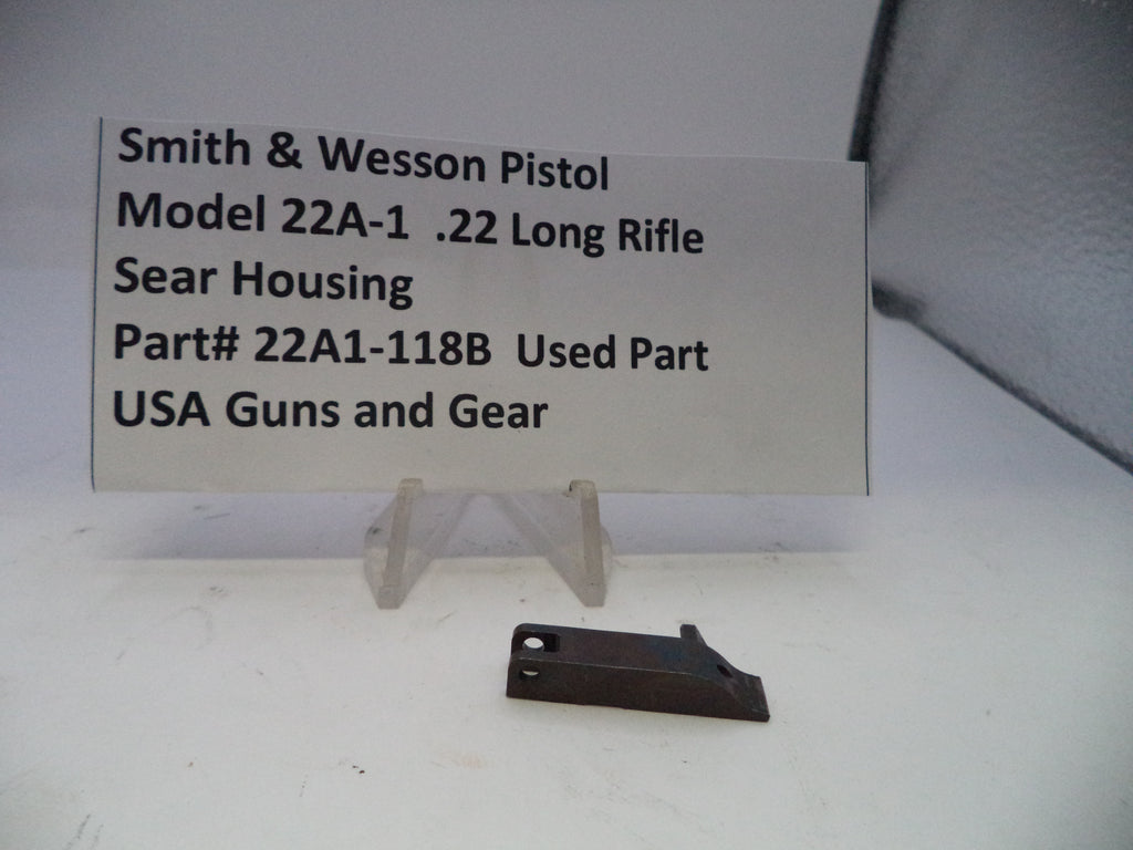 Smith & Wesson pistol part on a white background with a label