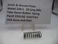 Smith & Wesson Pistol Model 22A-1 .22 Long Rifle take down button spring on a white background with a label.
