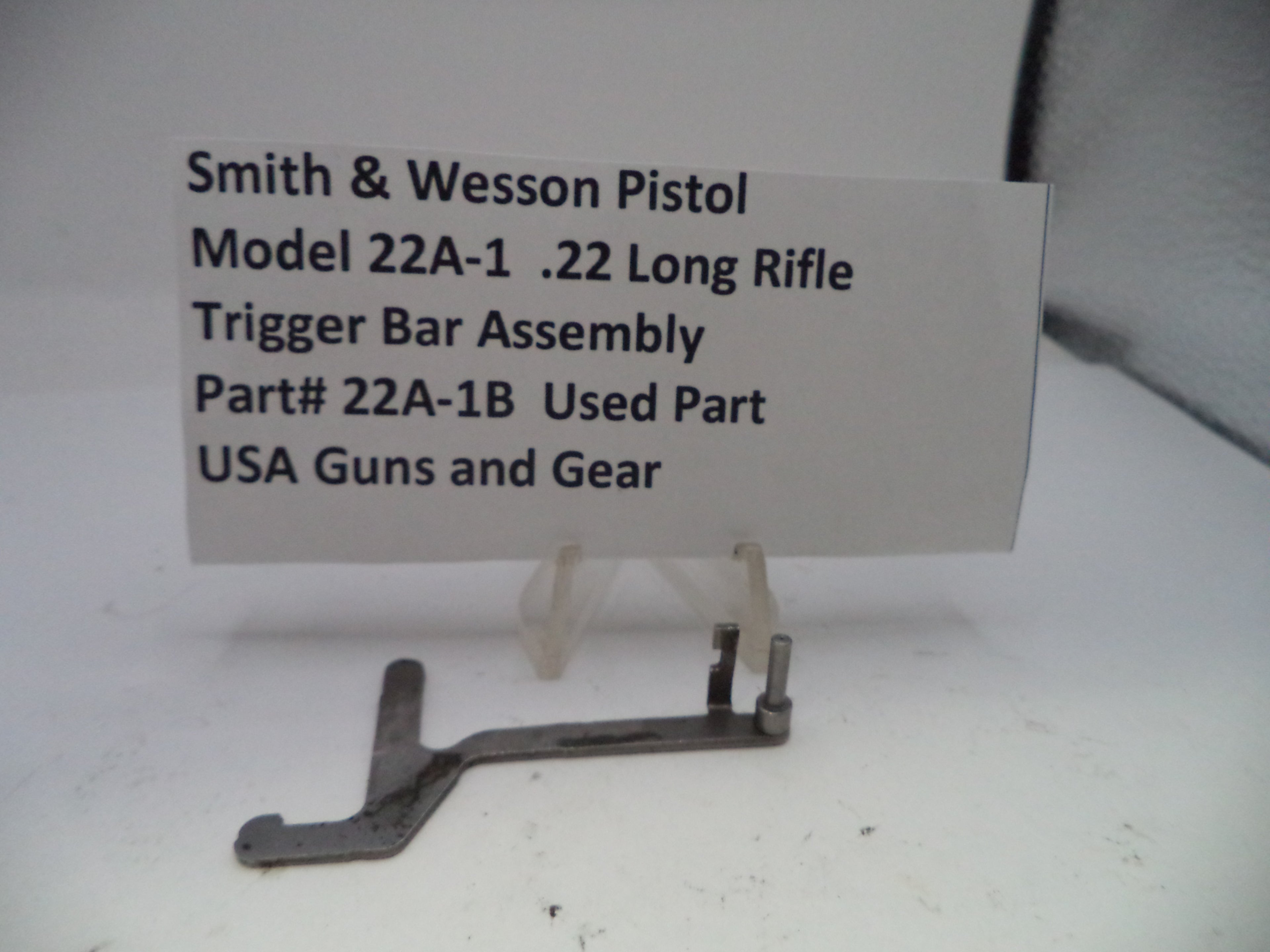Smith & Wesson Pistol Model 22A-1 .22 Long Rifle Trigger Bar Assembly on a white background with text label.