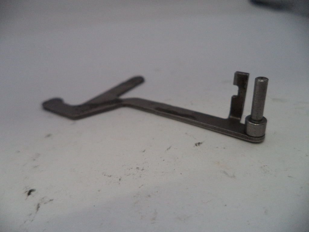 Metal tool on a white surface