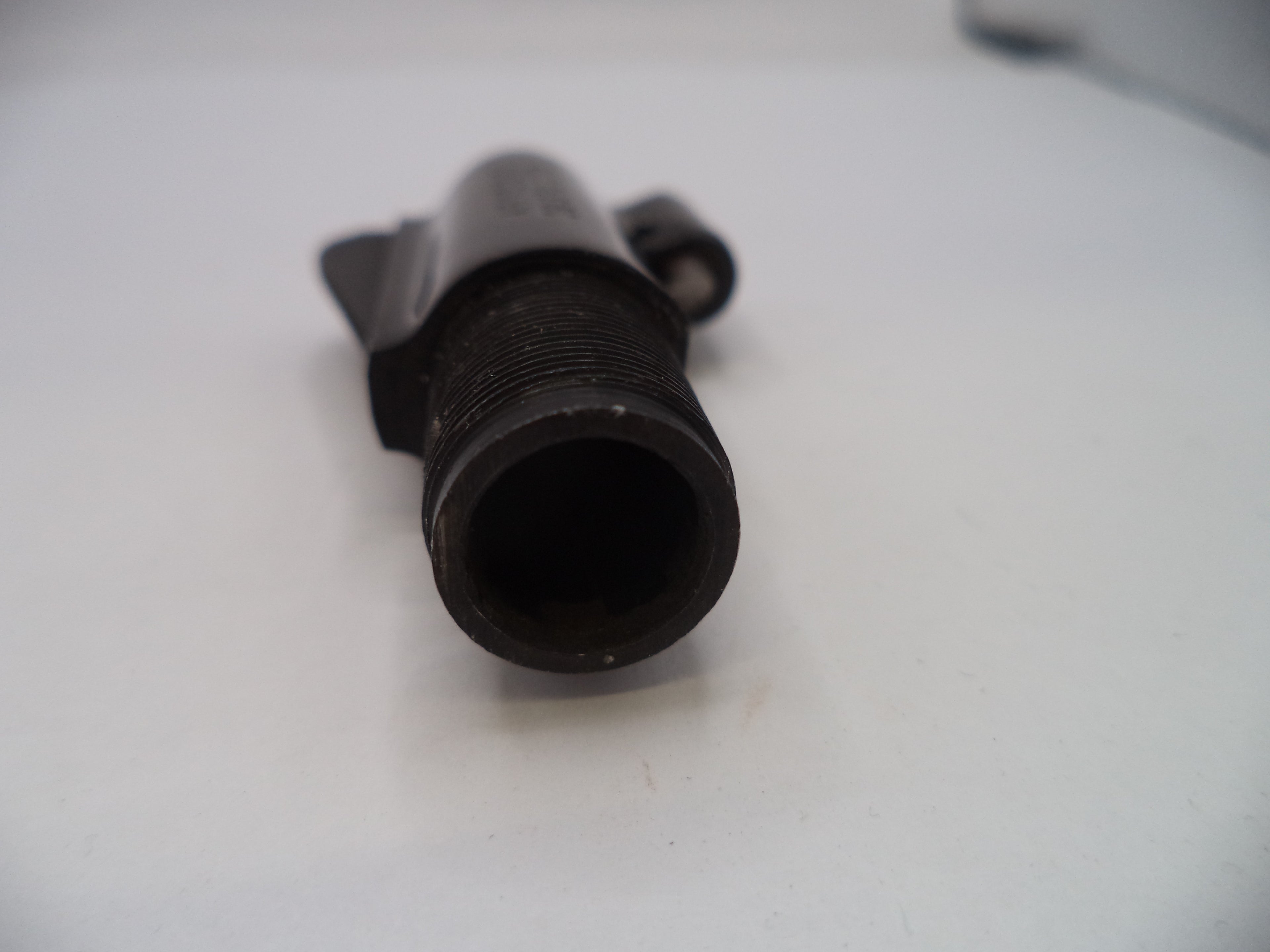 Black metal fitting on a white background
