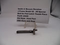 Smith & Wesson revolver part on a stand with a label