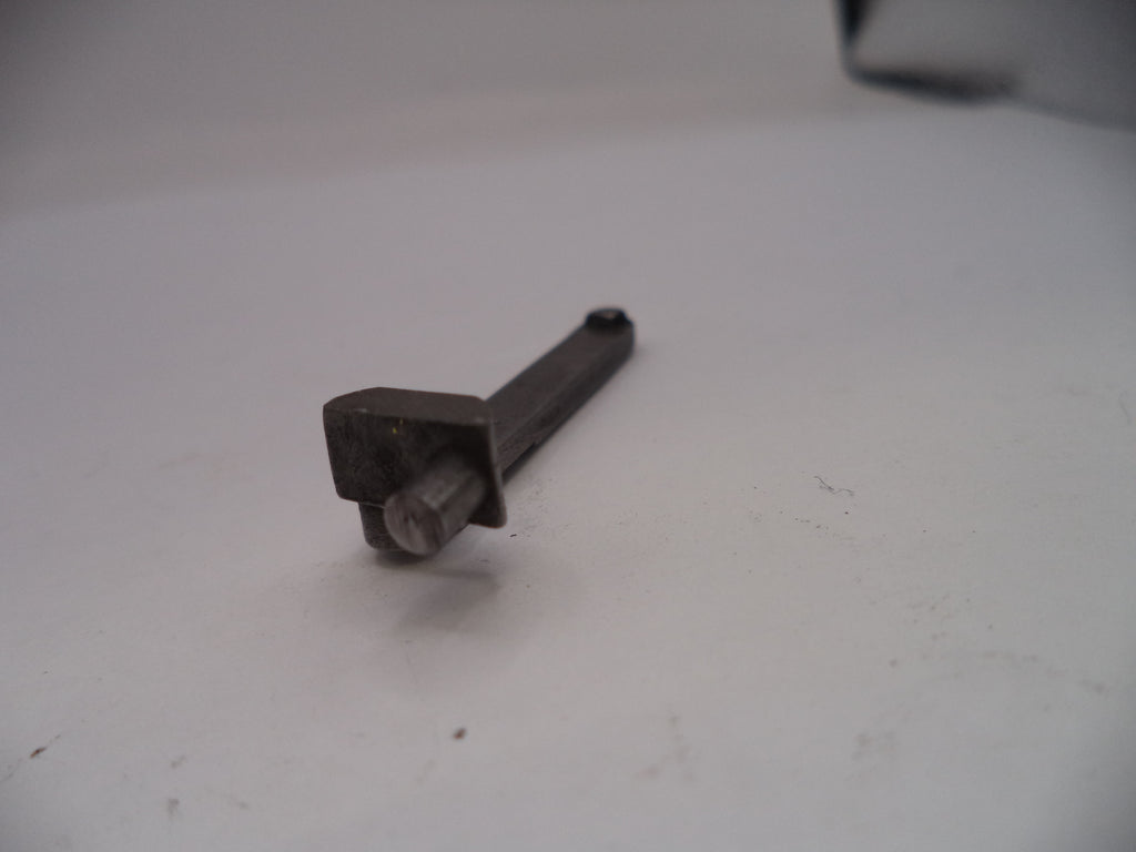 Metal bolt on a white surface