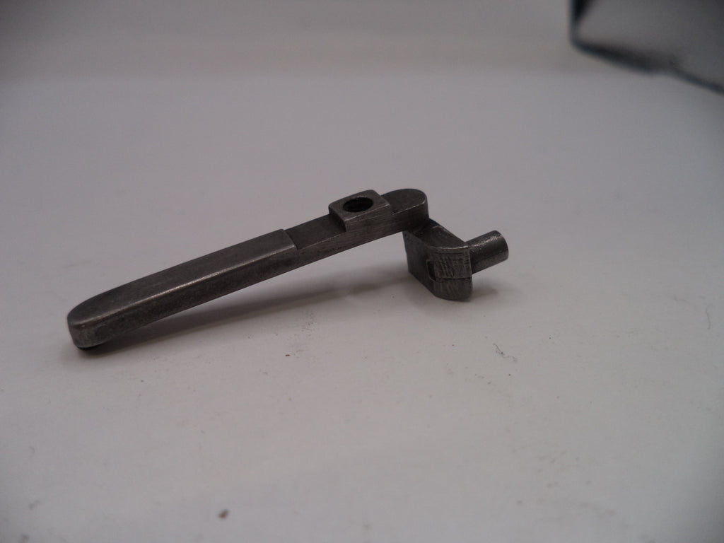 Metal tool on a white surface