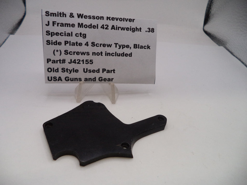 Black side plate for a Smith & Wesson Kevolver J Frame Model 42 Airweight on a white background with a label.