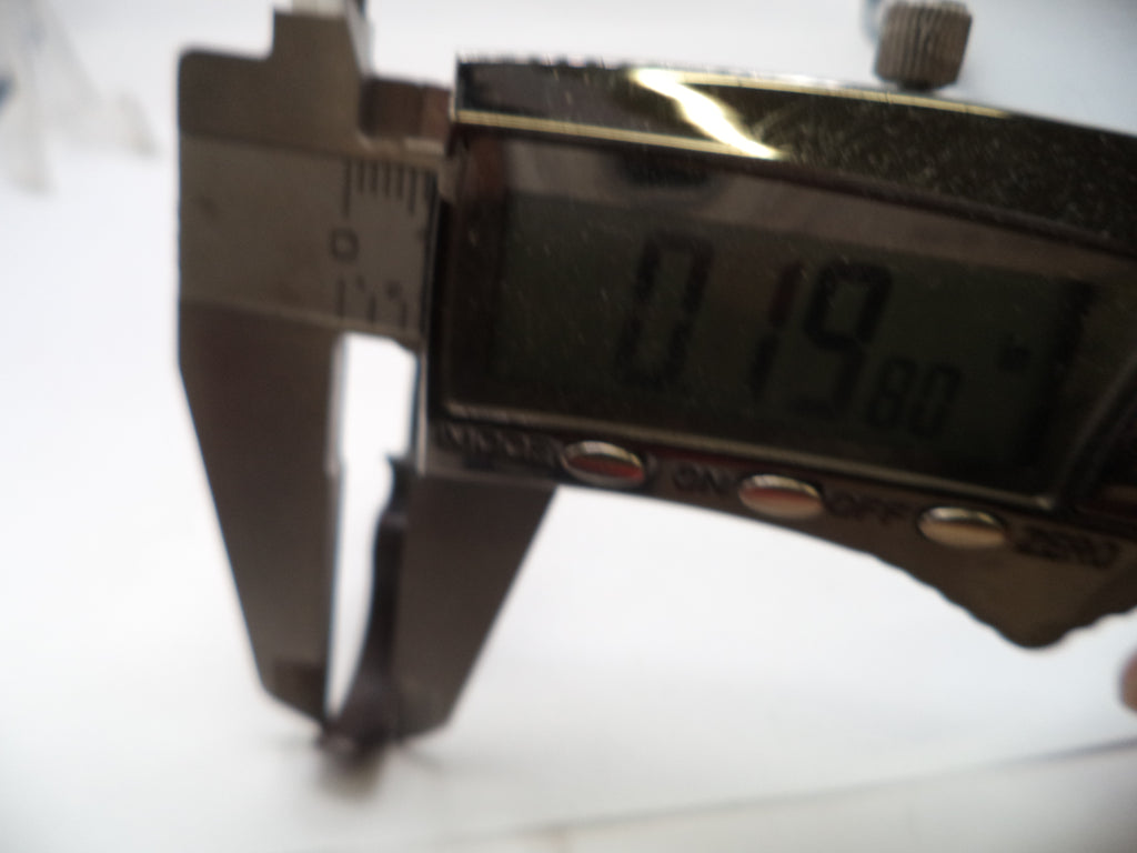 Digital caliper showing a measurement on a white background