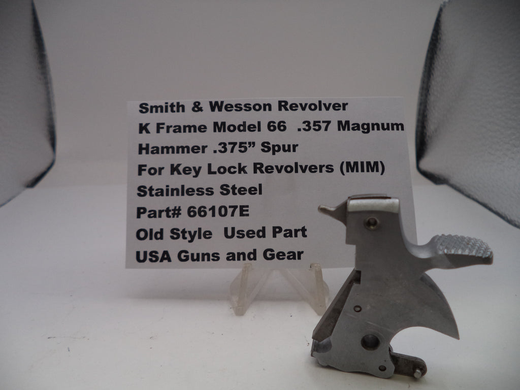 Smith & Wesson revolver part with descriptive text card on a white background