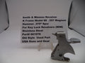 Smith & Wesson revolver part with descriptive text card on a white background