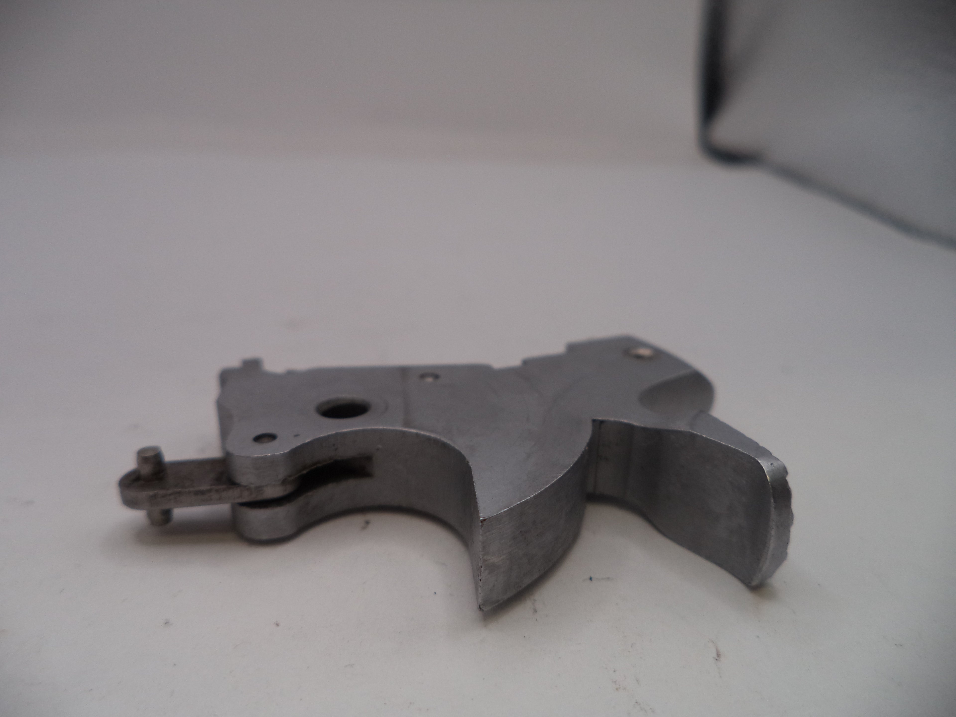Metallic mechanical component on a white surface