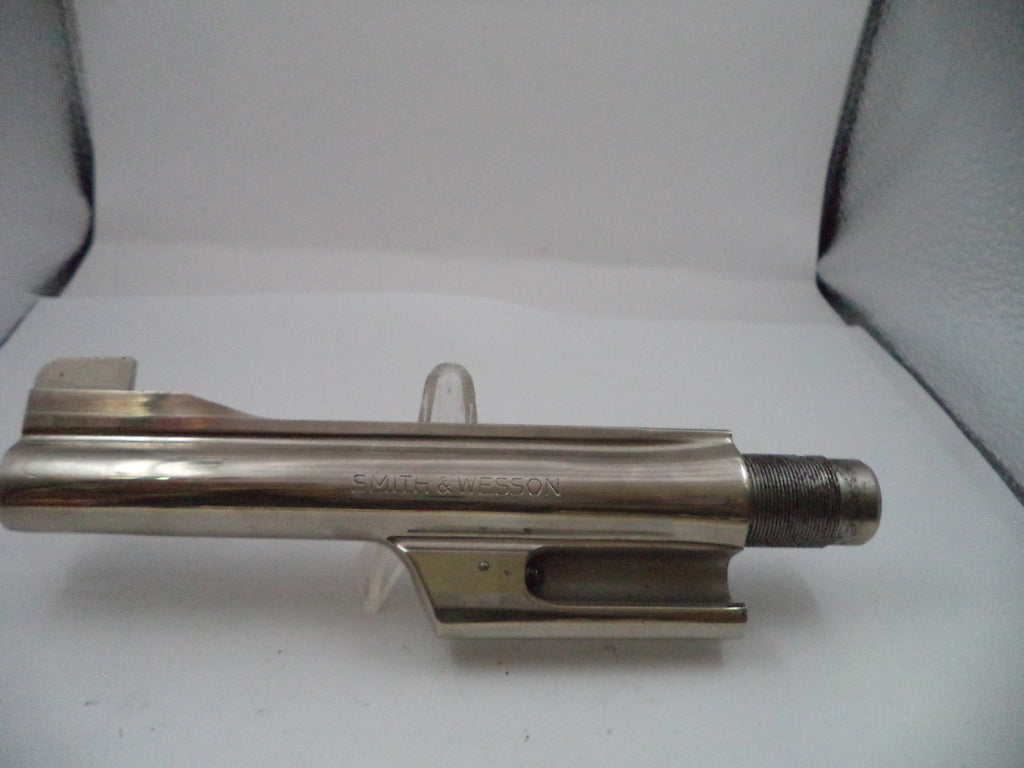 Metal tool or component on a white background