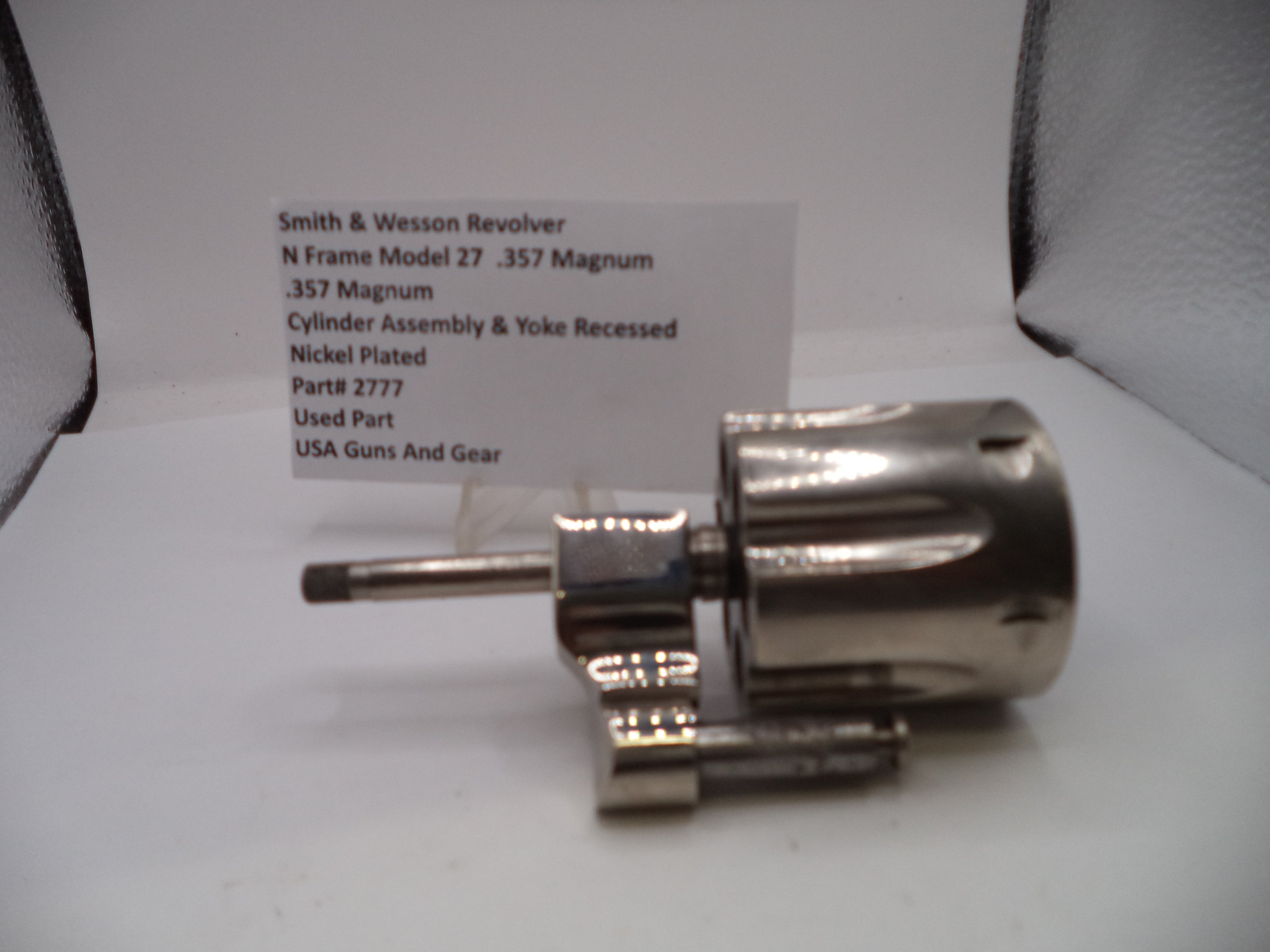 Smith & Wesson revolver cylinder assembly on a white background with text label