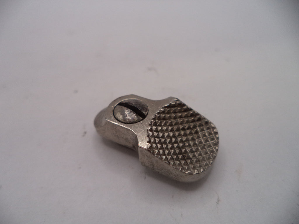 Metal tool with textured surface on a light gray background