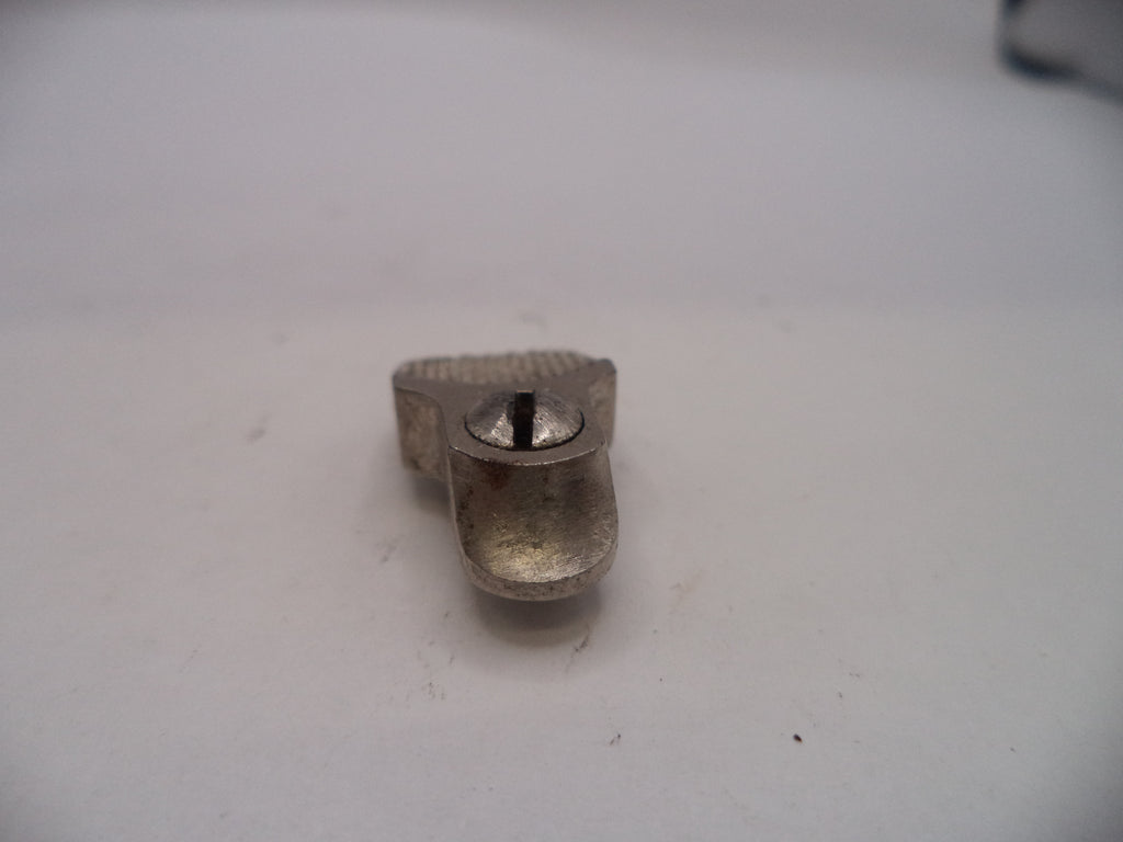 Metallic object on a white surface