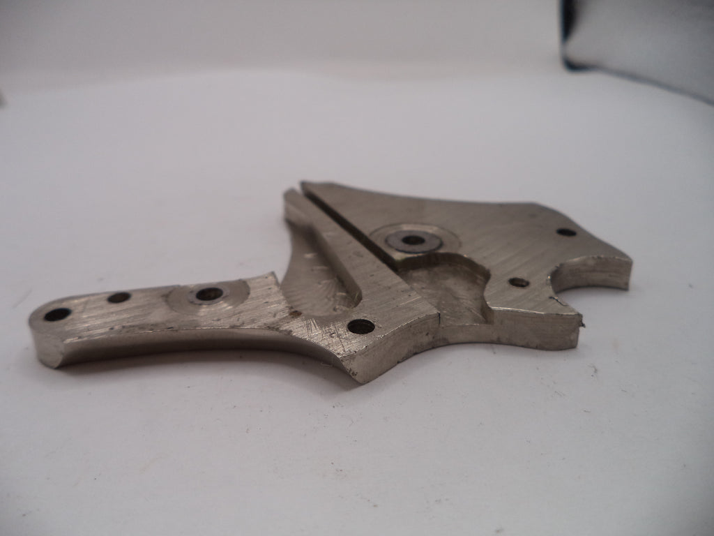 Metal mechanical component on a white surface