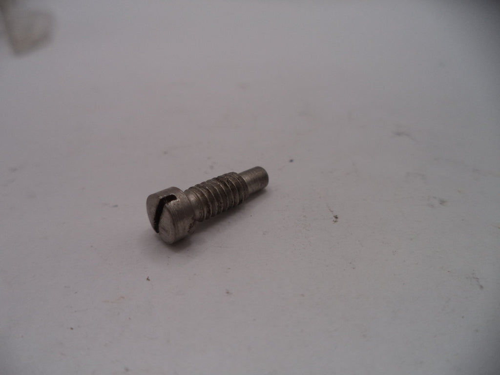 Metal screw on a white surface