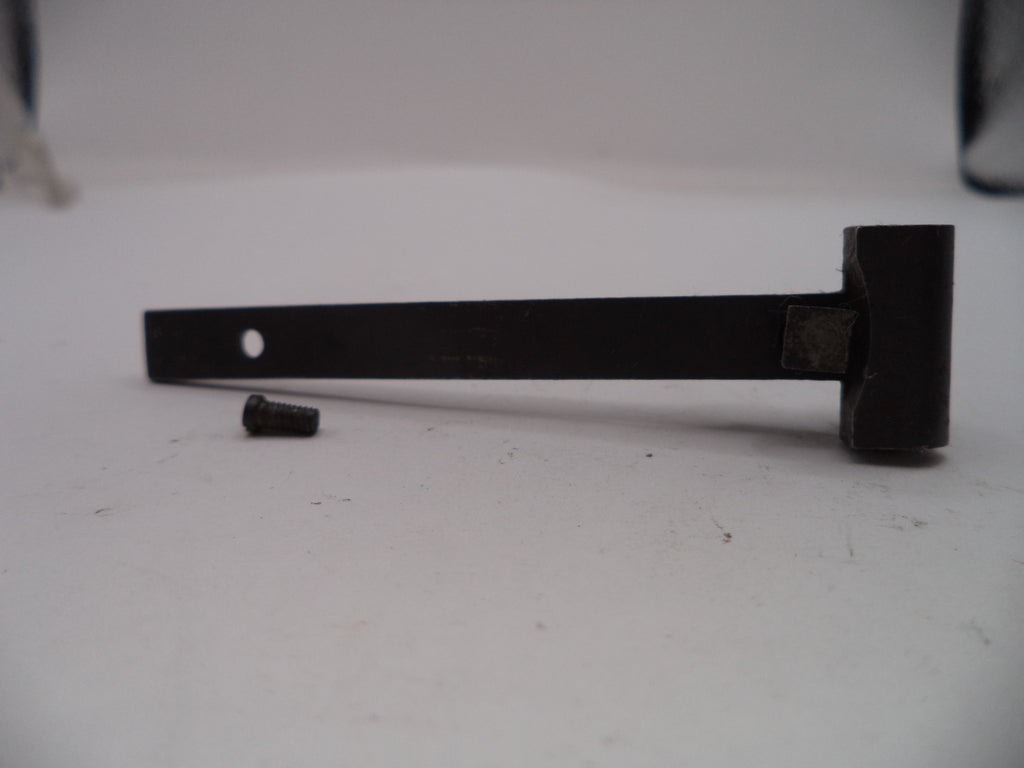Black metal bracket on a white surface