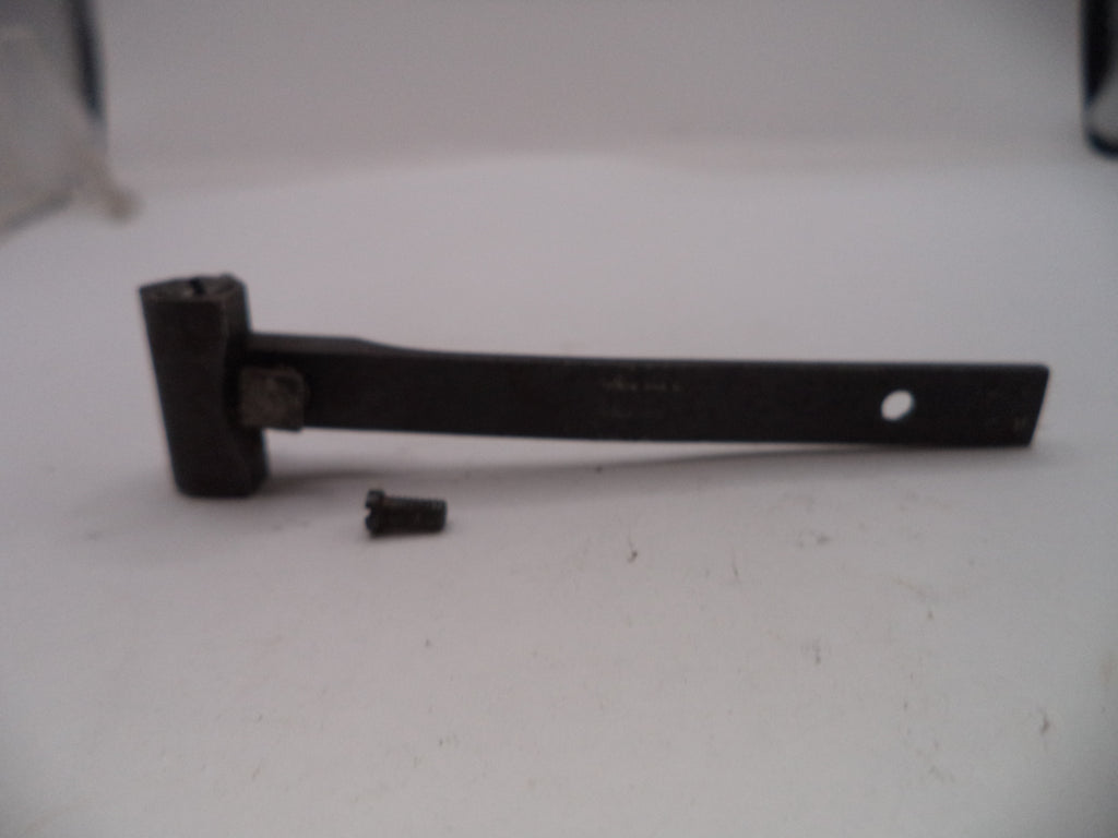 Black metal tool on a white surface