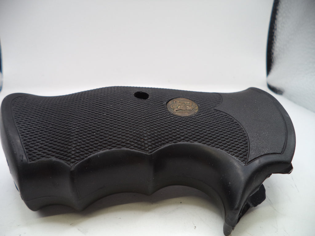 Black gun grip on a white background