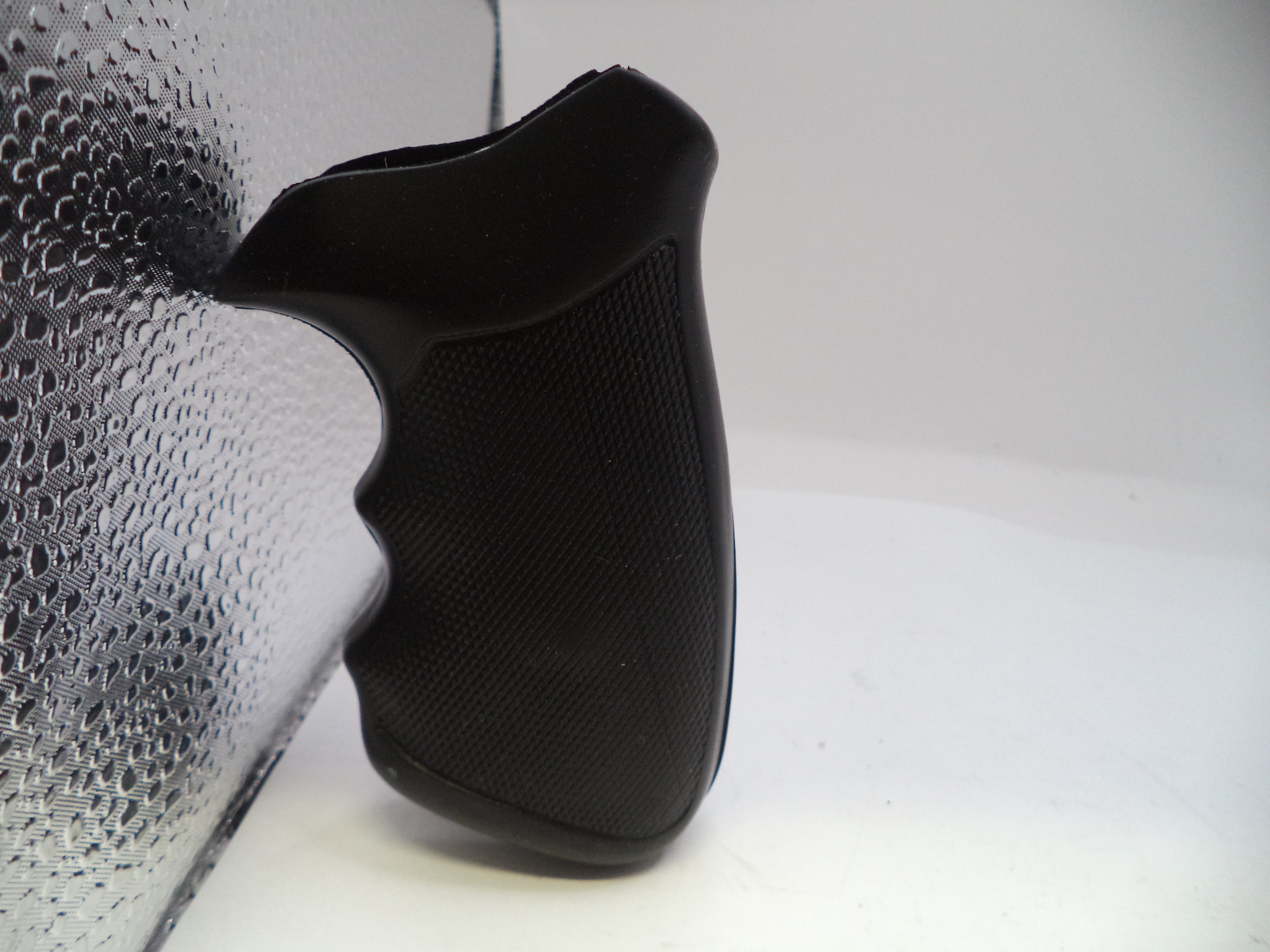 Black car seat cover on a white background