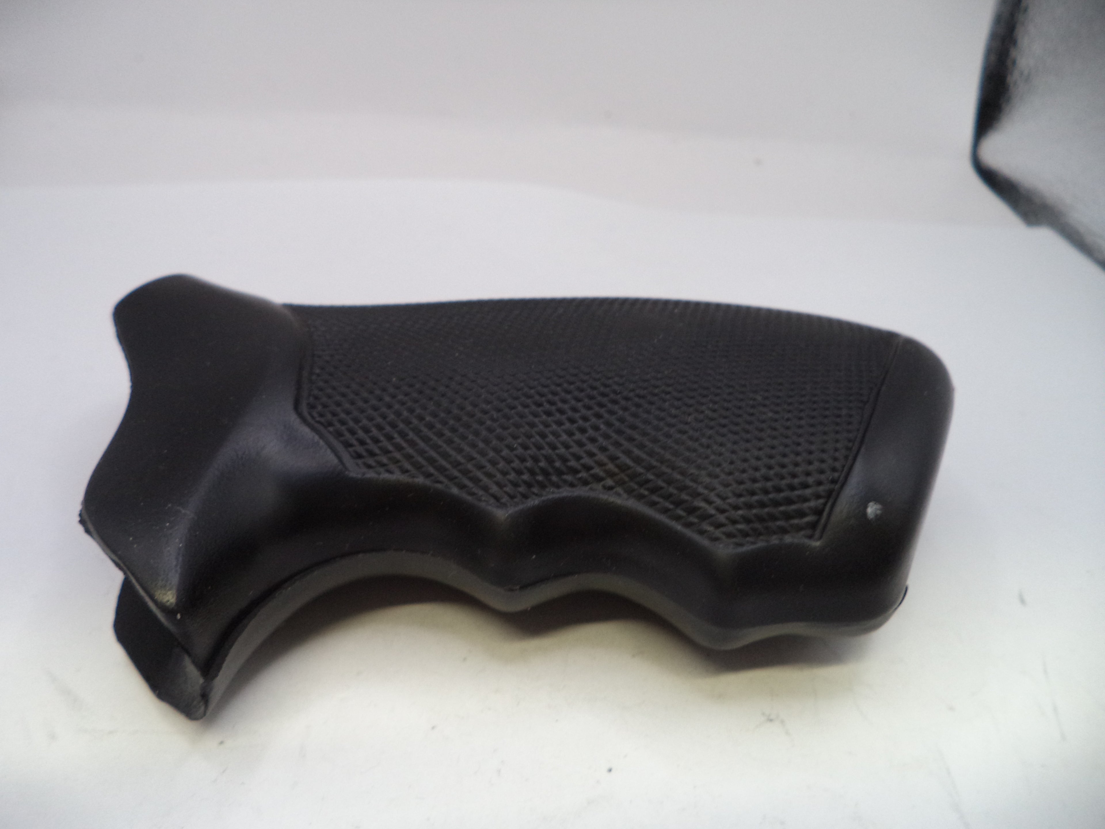 Black textured grip on a white background