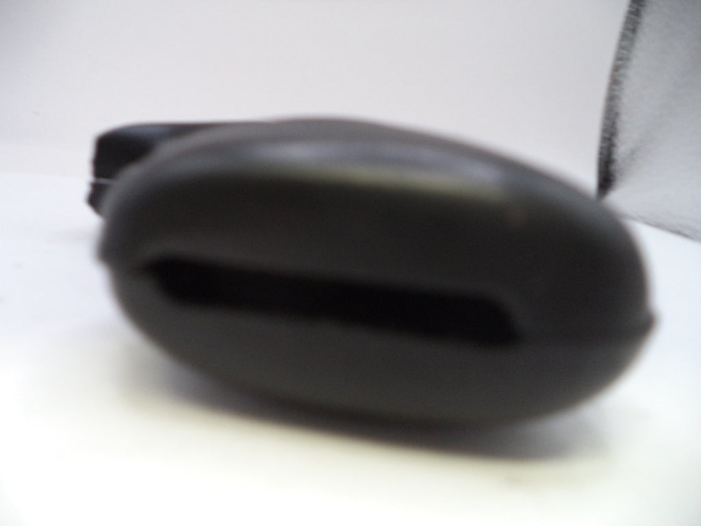 Blurred black object on a light background