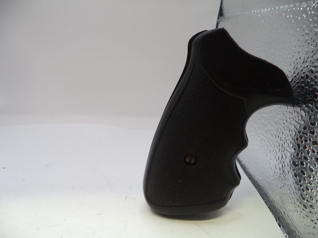 Black gun grip on a white background