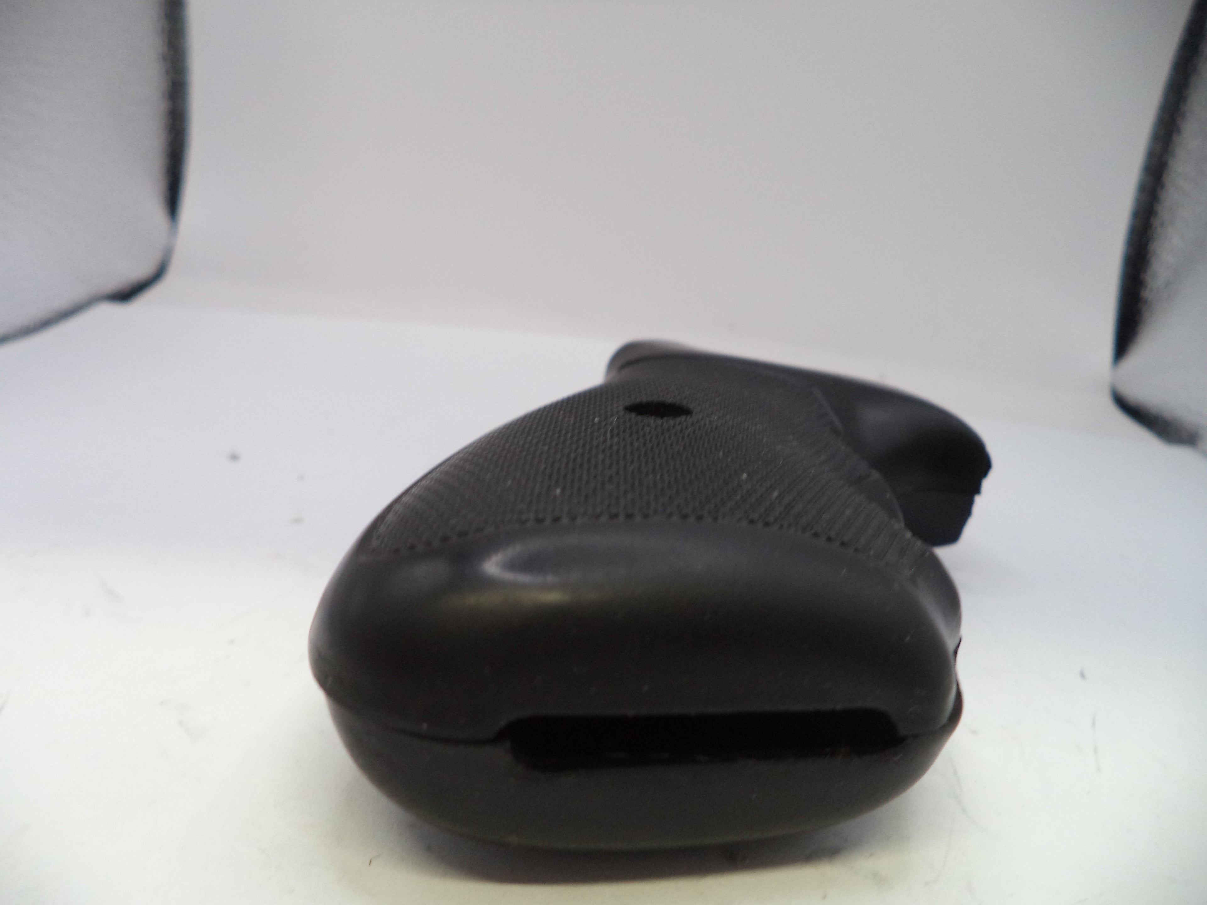 Black gun grip on a white background