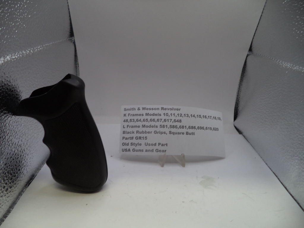 Black rubber grip on a stand with text in front of a textured white background