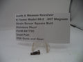 Smith & Wesson revolver part with descriptive card on a white background