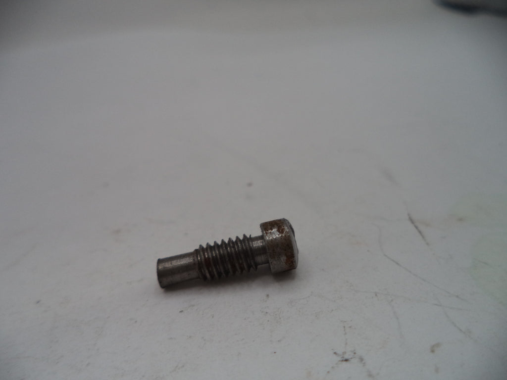Rust-covered bolt on a white surface