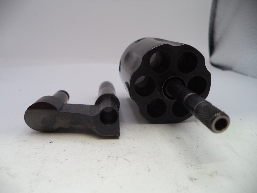 Black metal components on a white surface