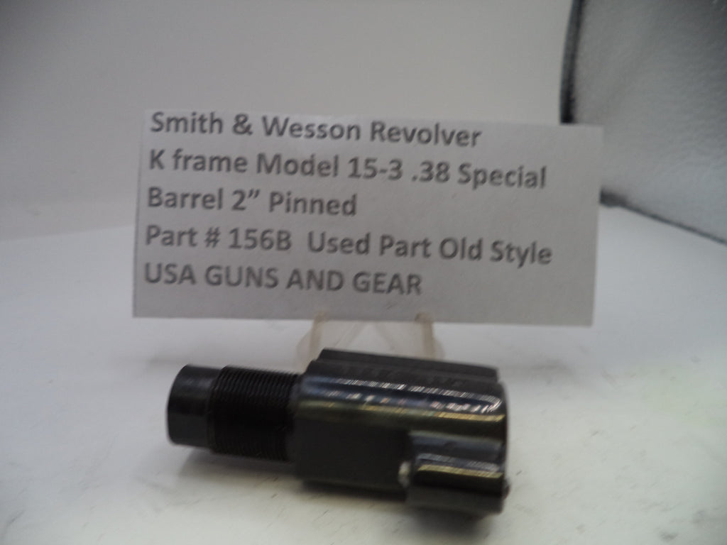 Smith & Wesson revolver barrel part with a label on a white background