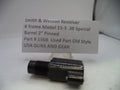 Smith & Wesson revolver barrel part with a label on a white background